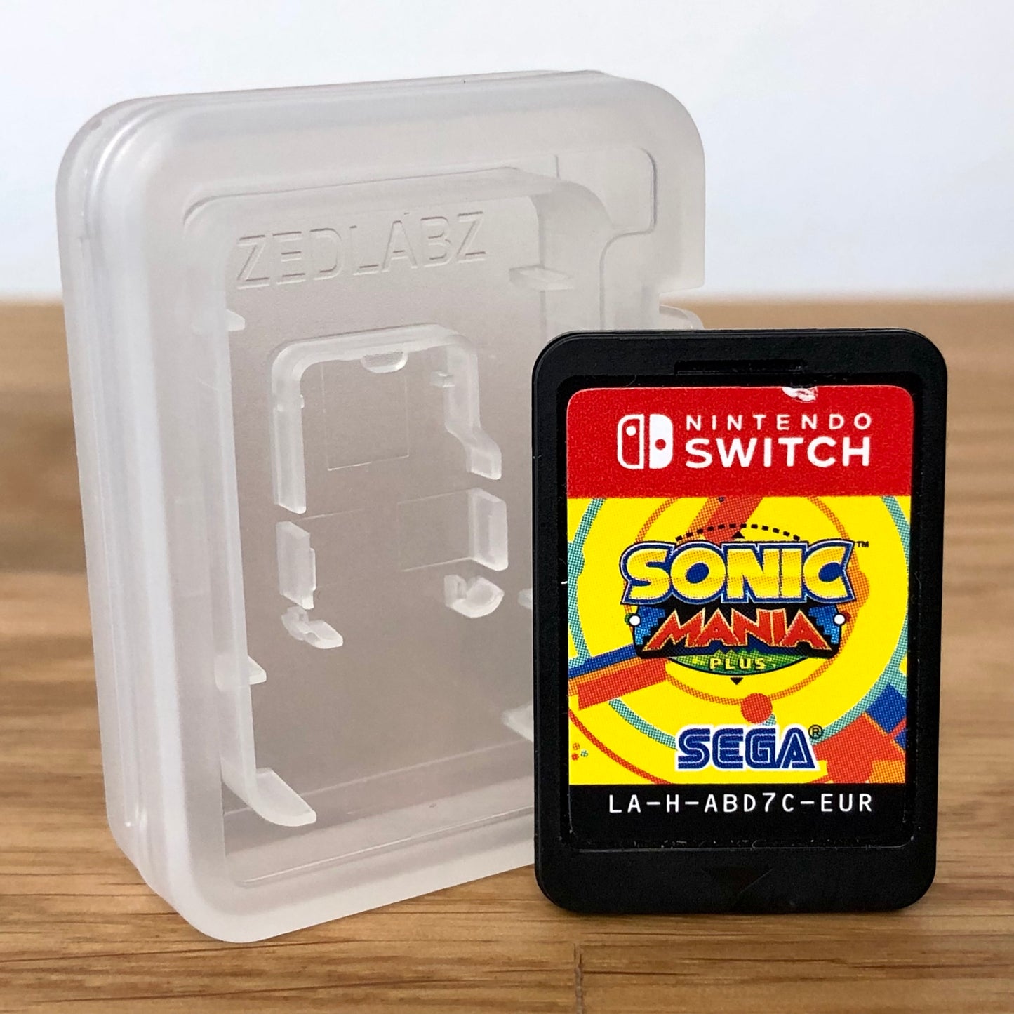 Cartridge front of Sonic Mania Plus for Nintendo Switch, featuring game title.