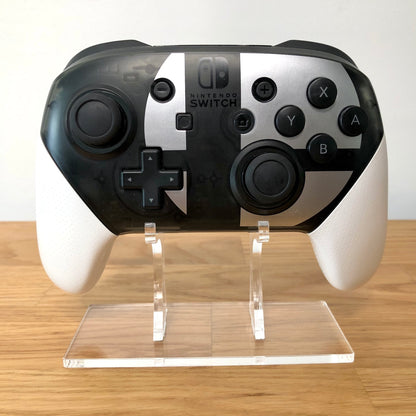 Front view of Nintendo Switch Pro Controller: Smash Bros. Edition, showing button layout and ergonomic design.