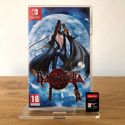 Front cover of Bayonetta for Nintendo Switch, featuring game artwork, title, and front of cartridge.