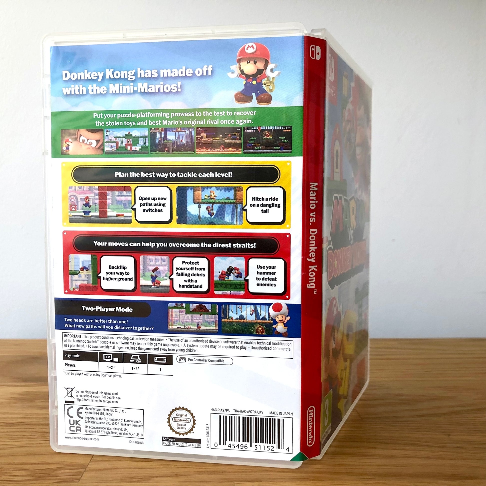 Angled back view of Mario vs Donkey Kong for Nintendo Switch, showing full back cover artwork.