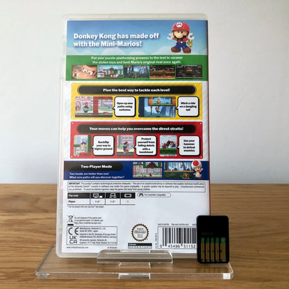 Back cover of Mario vs Donkey Kong for Nintendo Switch, showing game details, features, and back of cartridge.