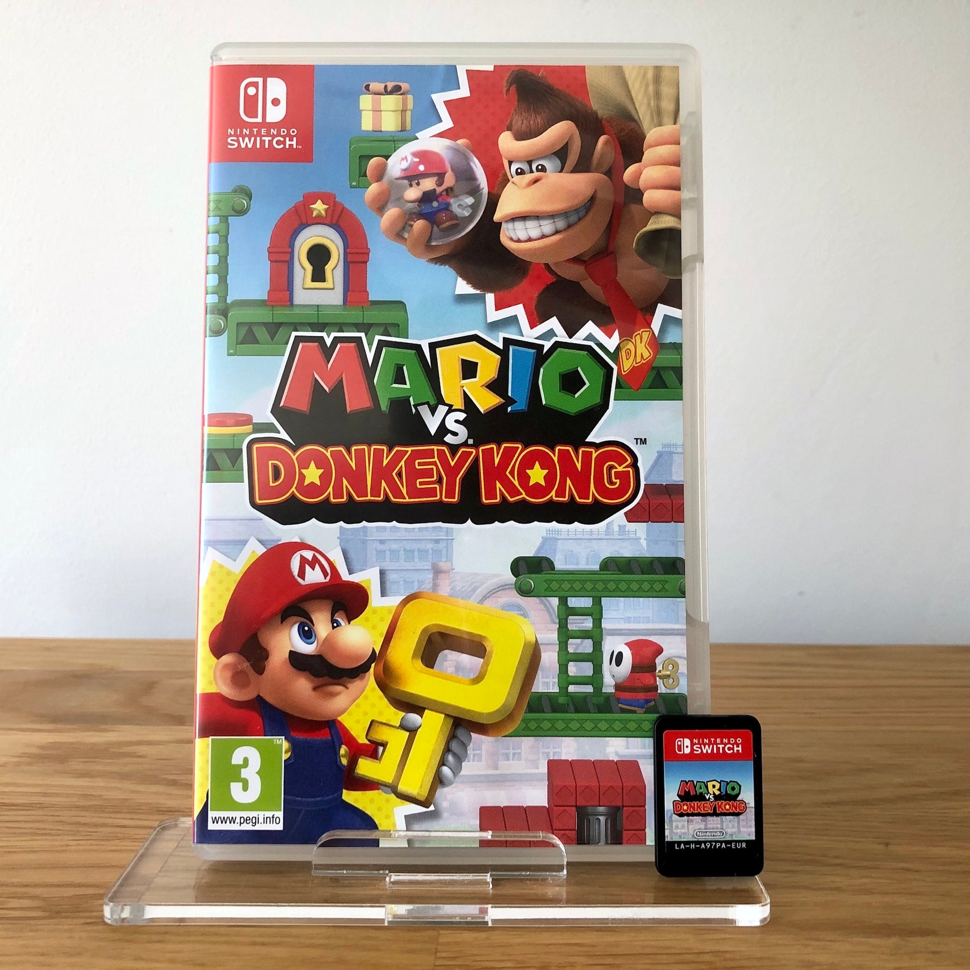 Front cover of Mario vs Donkey Kong for Nintendo Switch, featuring game artwork, title, and front of cartridge.