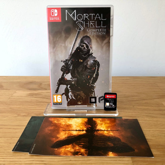 Front cover of Mortal Shell: Complete Edition for Nintendo Switch, featuring game artwork, title, and front of cartridge.