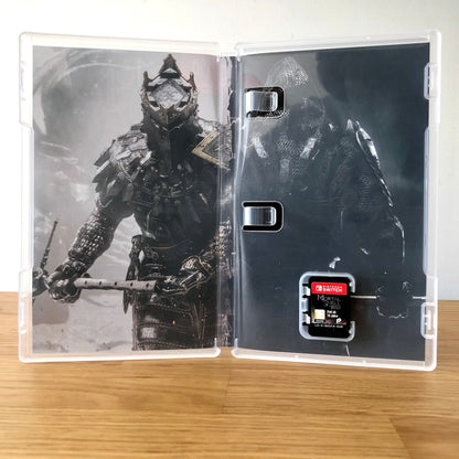 Inside the case of Mortal Shell: Complete Edition for Nintendo Switch, showing the cartridge and case design.