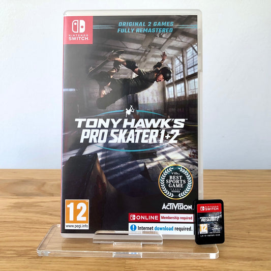 Front cover of Tony Hawk's Pro Skater 1 + 2 for Nintendo Switch, featuring game artwork, title, and front of cartridge.